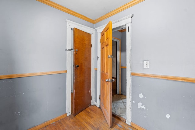 5212 S Honore St, Chicago, IL 60609 - hallway with wood-type flooring and ornamental molding