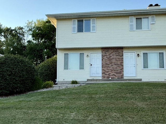 1508 Hancock Dr Unit 1, Normal, IL 61761 - view of front of house with a front yard