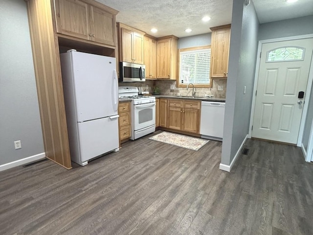 1508 Hancock Dr Unit 1, Normal, IL 61761 - kitchen featuring white appliances, dark wood-style floors, tasteful backsplash, a textured ceiling, and recessed lighting