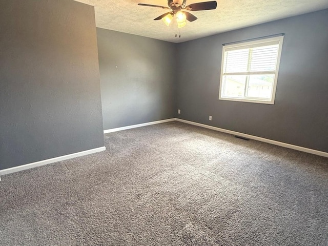 1508 Hancock Dr Unit 1, Normal, IL 61761 - carpeted spare room featuring a textured ceiling and ceiling fan