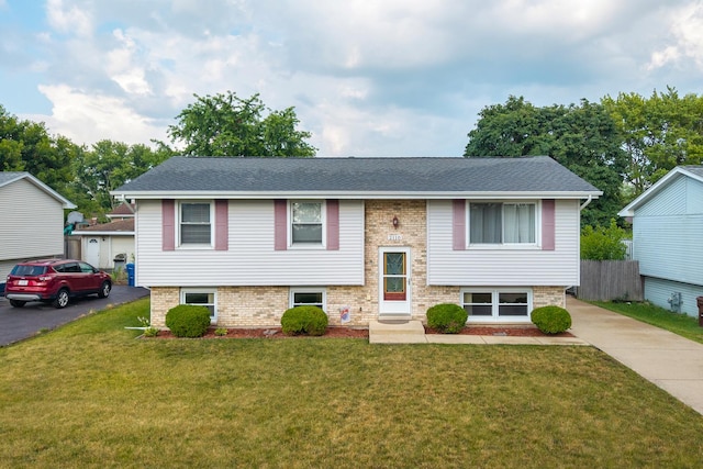 2110 Sanford Ave, New Lenox, IL 60451 - split foyer home featuring asphalt driveway, roof with shingles, and brick siding