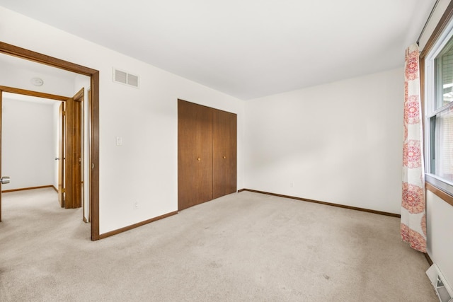 2110 Sanford Ave, New Lenox, IL 60451 - unfurnished bedroom featuring carpet floors and a closet