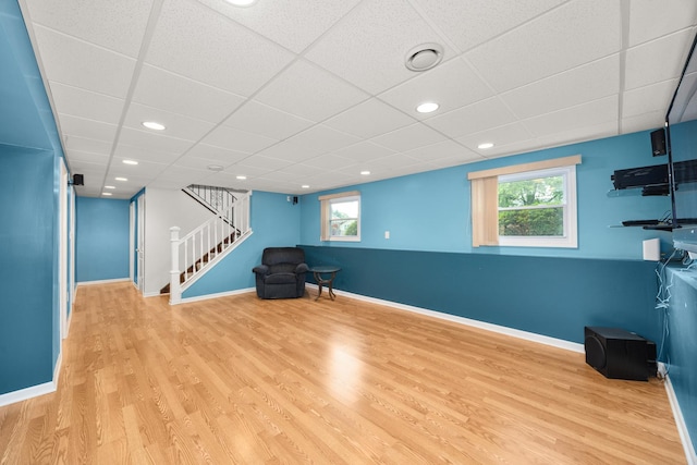 2110 Sanford Ave, New Lenox, IL 60451 - unfurnished room featuring stairway, wood finished floors, a paneled ceiling, plenty of natural light, and recessed lighting