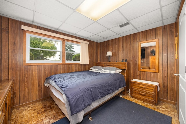 2110 Sanford Ave, New Lenox, IL 60451 - bedroom featuring wood walls and a drop ceiling
