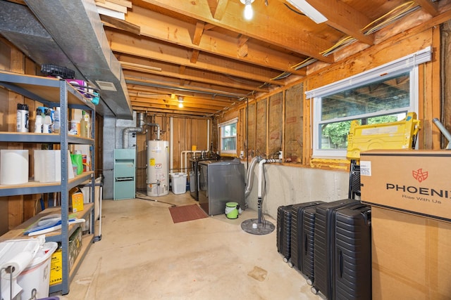 2110 Sanford Ave, New Lenox, IL 60451 - below grade area with water heater, washing machine and dryer, and drainage system