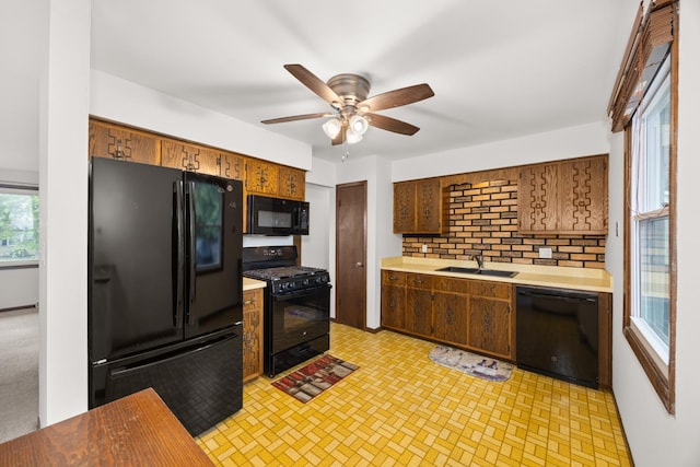 2110 Sanford Ave, New Lenox, IL 60451 - kitchen featuring black appliances, light countertops, a ceiling fan, and tasteful backsplash
