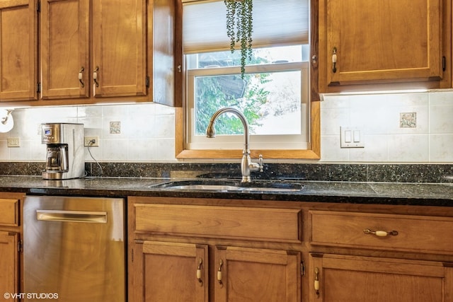 920 Barnside Rd, New Lenox, IL 60451 - kitchen with stainless steel dishwasher, brown cabinetry, tasteful backsplash, and dark stone countertops