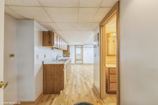 920 Barnside Rd, New Lenox, IL 60451 - kitchen with a drop ceiling, light wood-type flooring, brown cabinets, and light countertops