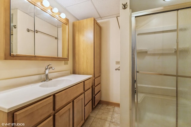 920 Barnside Rd, New Lenox, IL 60451 - bathroom with vanity, tile patterned floors, a shower with shower door, and a paneled ceiling