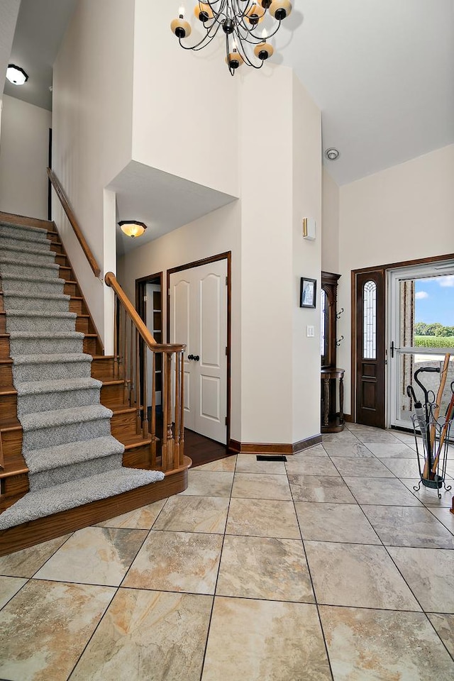 4751 N 5500w Rd, Kankakee, IL 60901 - foyer entrance featuring a high ceiling, a chandelier, and stairway