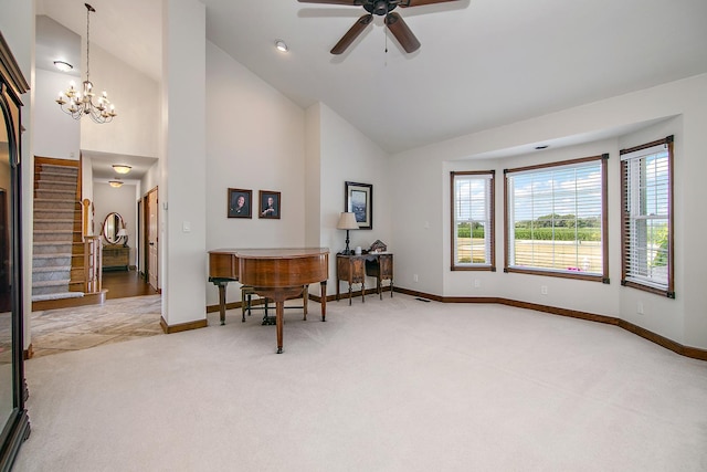4751 N 5500w Rd, Kankakee, IL 60901 - sitting room featuring light colored carpet, high vaulted ceiling, a ceiling fan, stairway, and a chandelier