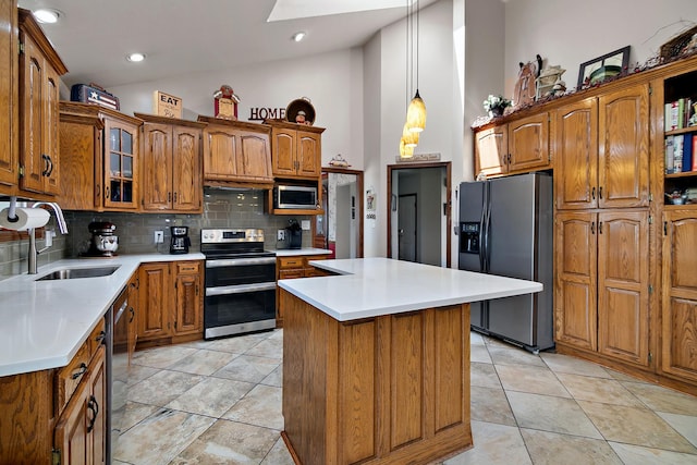 4751 N 5500w Rd, Kankakee, IL 60901 - kitchen with stainless steel appliances, a skylight, brown cabinets, recessed lighting, and high vaulted ceiling