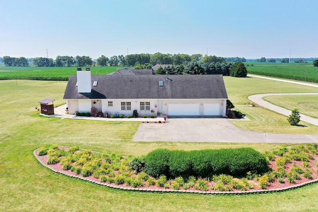 4751 N 5500w Rd, Kankakee, IL 60901 - single story home with an attached garage, a front lawn, a view of countryside, and asphalt driveway