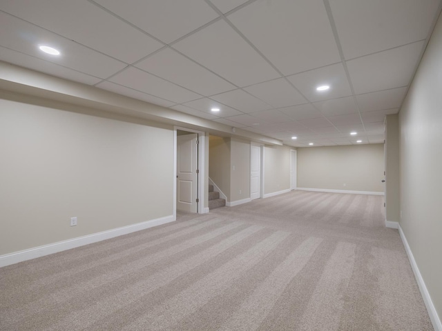 14746 Mercury Ln, Bloomington, IL 61705 - finished basement featuring light colored carpet, recessed lighting, stairs, and a drop ceiling