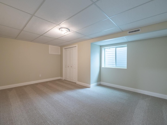 14746 Mercury Ln, Bloomington, IL 61705 - basement featuring a drop ceiling and carpet flooring