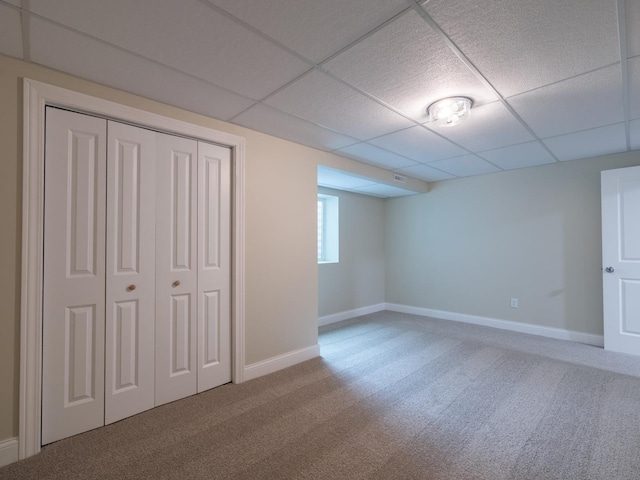 14746 Mercury Ln, Bloomington, IL 61705 - unfurnished bedroom with carpet floors, a paneled ceiling, and a closet