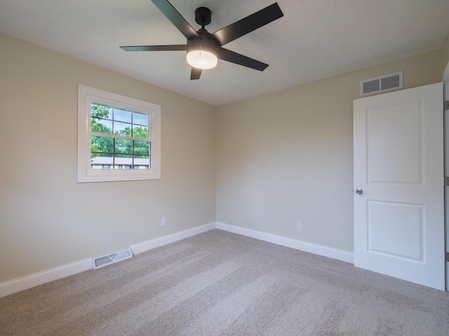 14746 Mercury Ln, Bloomington, IL 61705 - spare room with carpet floors and a ceiling fan