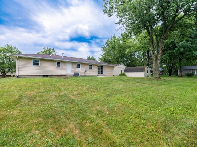 14746 Mercury Ln, Bloomington, IL 61705 - back of property with a lawn