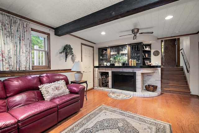 15630 Le Claire Ave, Oak Forest, IL 60452 - living area featuring a fireplace, wood finished floors, crown molding, ceiling fan, and recessed lighting