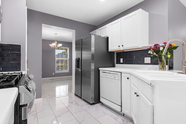 2225 National Sewing Ave, Belvidere, IL 61008 - kitchen with appliances with stainless steel finishes, a chandelier, backsplash, and light marble finish floors