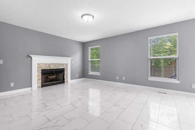 2225 National Sewing Ave, Belvidere, IL 61008 - unfurnished living room with a fireplace and marble look tile flooring