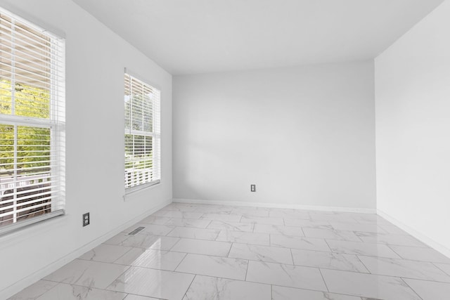 2225 National Sewing Ave, Belvidere, IL 61008 - empty room featuring light marble finish flooring