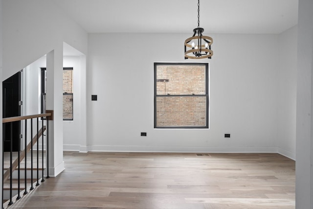 2305 W 111th Pl, Chicago, IL 60643 - spare room with light wood-style floors and a chandelier