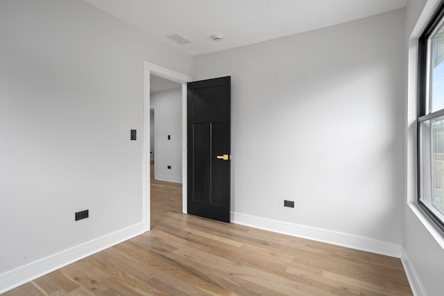 2305 W 111th Pl, Chicago, IL 60643 - spare room featuring light wood finished floors, healthy amount of natural light, and a smoke detector