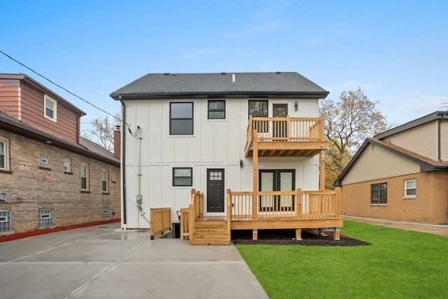 2305 W 111th Pl, Chicago, IL 60643 - rear view of house featuring a balcony, board and batten siding, a lawn, roof with shingles, and a patio