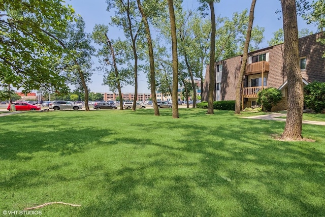 214 Madison St Unit 3A, Joliet, IL 60435 - surrounding community featuring a lawn