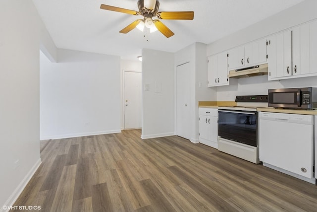 214 Madison St Unit 3A, Joliet, IL 60435 - kitchen featuring white appliances, under cabinet range hood, wood finished floors, ceiling fan, and light countertops