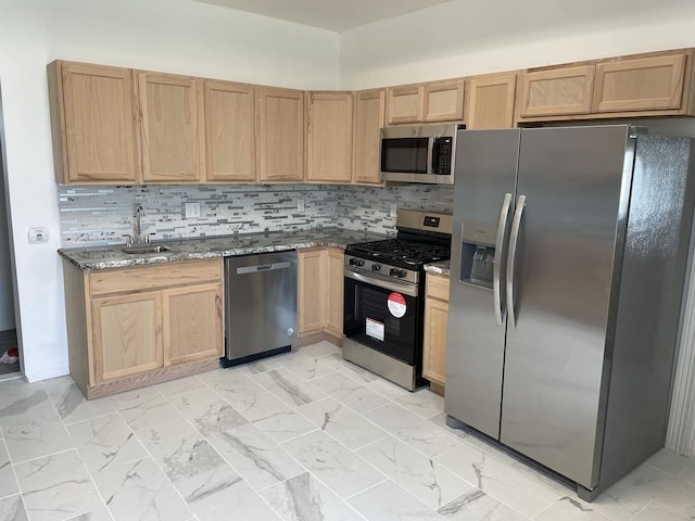355 N 5th St, Sheldon, IL 60966 - kitchen with stainless steel appliances, stone countertops, light brown cabinets, and backsplash