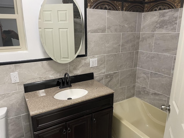 355 N 5th St, Sheldon, IL 60966 - bathroom featuring vanity,  shower combination, decorative backsplash, and tile walls