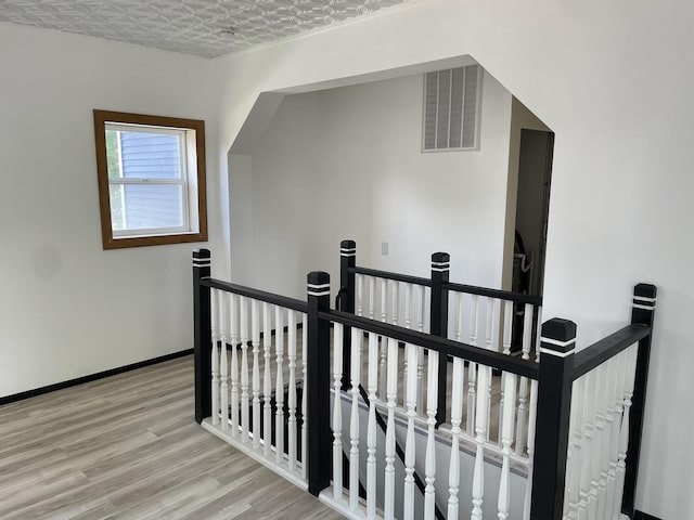 355 N 5th St, Sheldon, IL 60966 - staircase with wood finished floors and baseboards