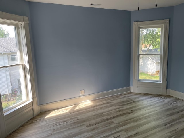 355 N 5th St, Sheldon, IL 60966 - unfurnished room featuring wood finished floors and baseboards