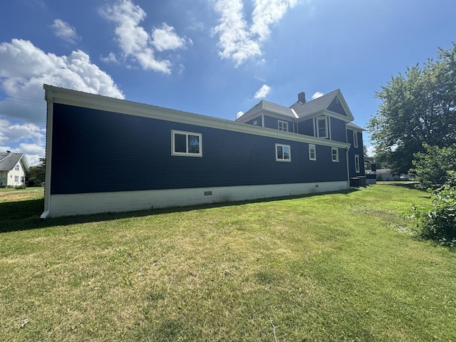 355 N 5th St, Sheldon, IL 60966 - rear view of property with crawl space and a lawn