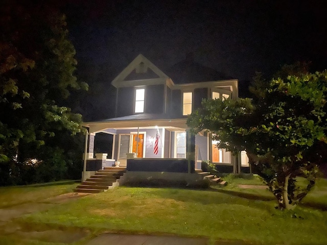 355 N 5th St, Sheldon, IL 60966 - victorian-style house with a porch and a yard