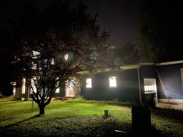 355 N 5th St, Sheldon, IL 60966 - yard at night featuring a yard