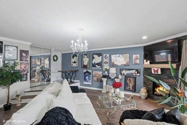 48 Parliament Dr W Unit 132, Palos Heights, IL 60463 - living room with crown molding, wood finished floors, a chandelier, a fireplace, and recessed lighting