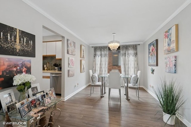 48 Parliament Dr W Unit 132, Palos Heights, IL 60463 - dining room featuring a chandelier, crown molding, and wood finished floors