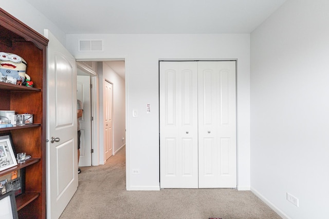 2366 Aurora Dr, Pingree Grove, IL 60140 - unfurnished bedroom with light colored carpet and a closet
