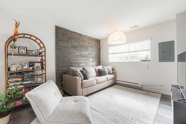 2366 Aurora Dr, Pingree Grove, IL 60140 - living area featuring electric panel, wood finished floors, and a baseboard radiator