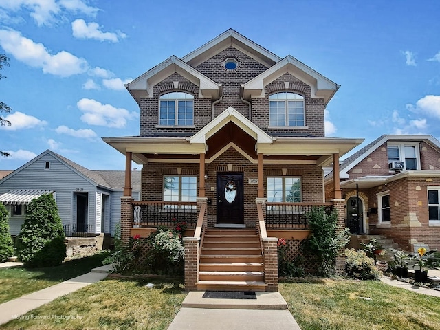 3129 N Oconto Ave, Chicago, IL 60707 - view of front facade featuring brick siding, a porch, and a front yard