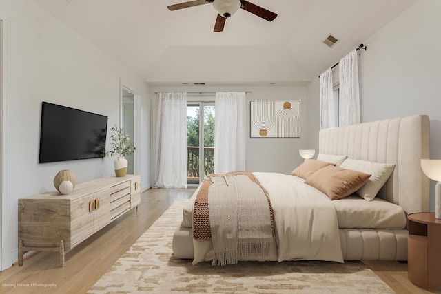 3129 N Oconto Ave, Chicago, IL 60707 - bedroom featuring wood finished floors, access to exterior, a ceiling fan, and a raised ceiling