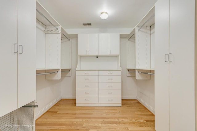 3129 N Oconto Ave, Chicago, IL 60707 - walk in closet featuring light wood-type flooring