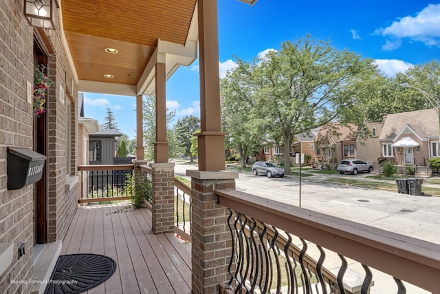 3129 N Oconto Ave, Chicago, IL 60707 - wooden porch with a residential view