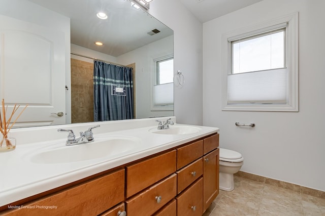 3129 N Oconto Ave, Chicago, IL 60707 - bathroom with double vanity, a shower with shower curtain, and recessed lighting