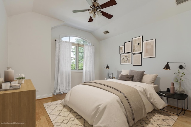 3129 N Oconto Ave, Chicago, IL 60707 - bedroom featuring vaulted ceiling, light wood-type flooring, and a ceiling fan