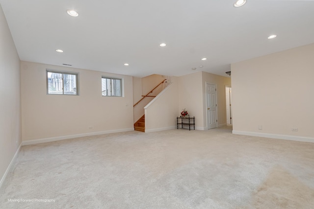 3129 N Oconto Ave, Chicago, IL 60707 - basement with recessed lighting, light carpet, and stairway