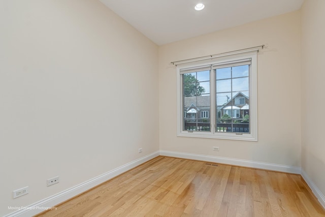 3129 N Oconto Ave, Chicago, IL 60707 - spare room with light wood finished floors and recessed lighting